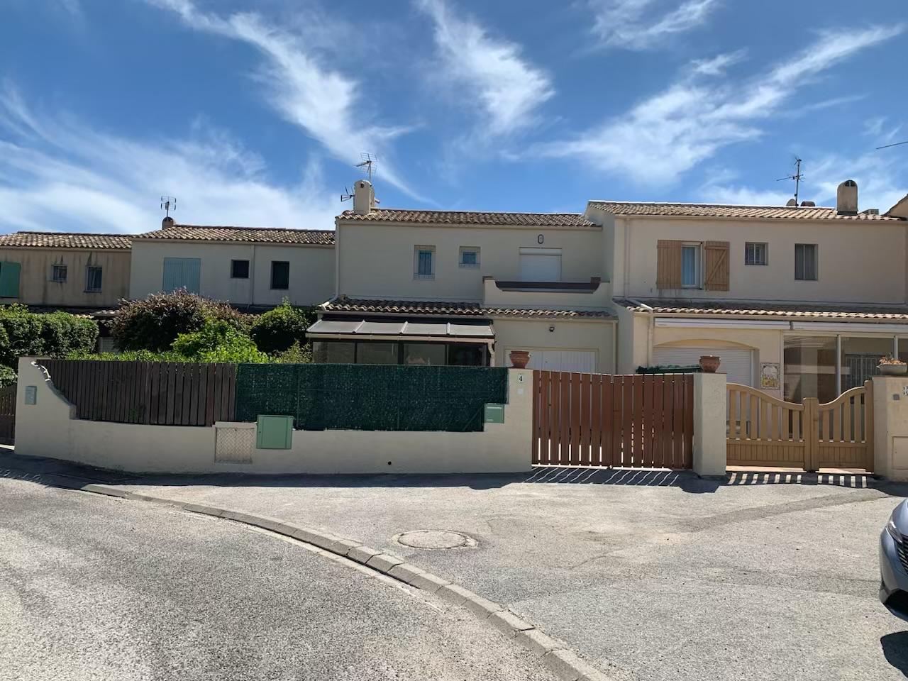 Maison et clôture rénovées – Avenir Construction